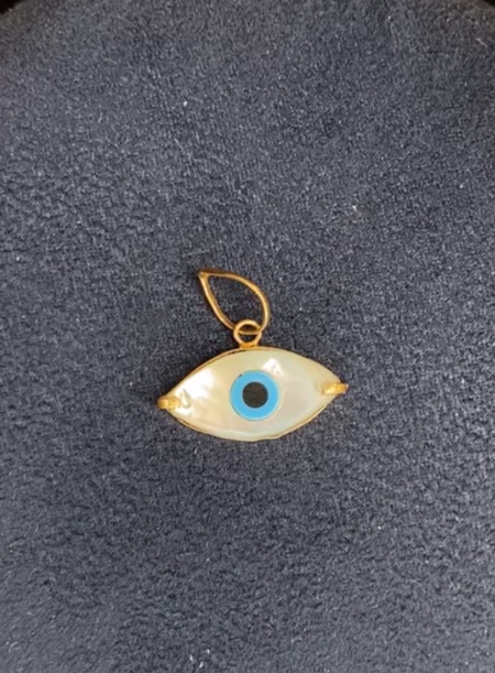 14 kt reversible evil eye pendant