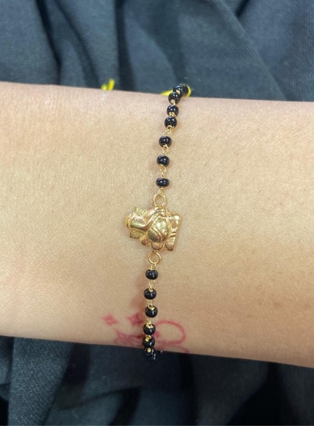 Blackbeads bracelet with ganesh pendant