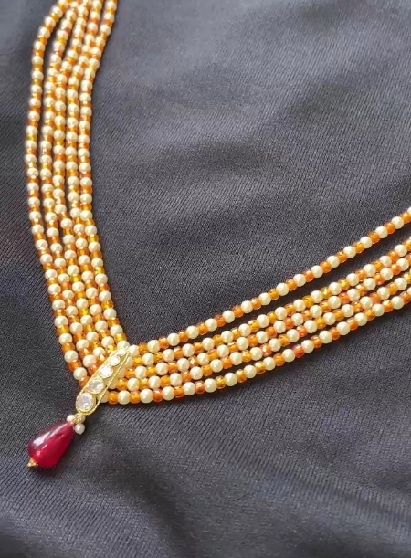 Orange and white beads necklace