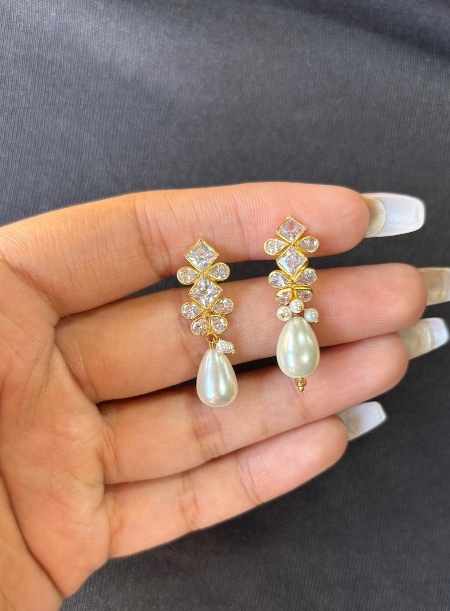 White flower earrings with white pearl